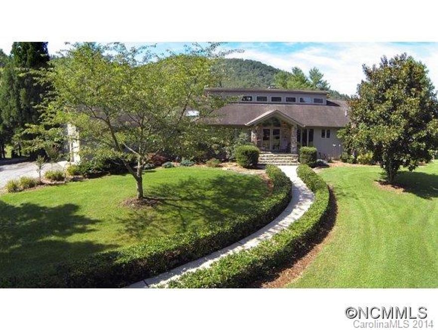 Over 32 rolling acres nestled behind restricted upscale Cane Creek Valley neighborhood. Secluded and quiet, property is perfect as family compound, B&B, vacation rental or retreat center. Includes 5 BR house w/5 fireplaces, in-law apt, pool, pavillion, 2 bed/2 bath cottage, and 6 stall barn with apartment.  9.8 A fenced pasture & 15 wooded. Includes 2 stocked ponds, walking and riding trail and views. 16 A option #3132464. 10 acre option with barn, apartment,  and building site at # 5912