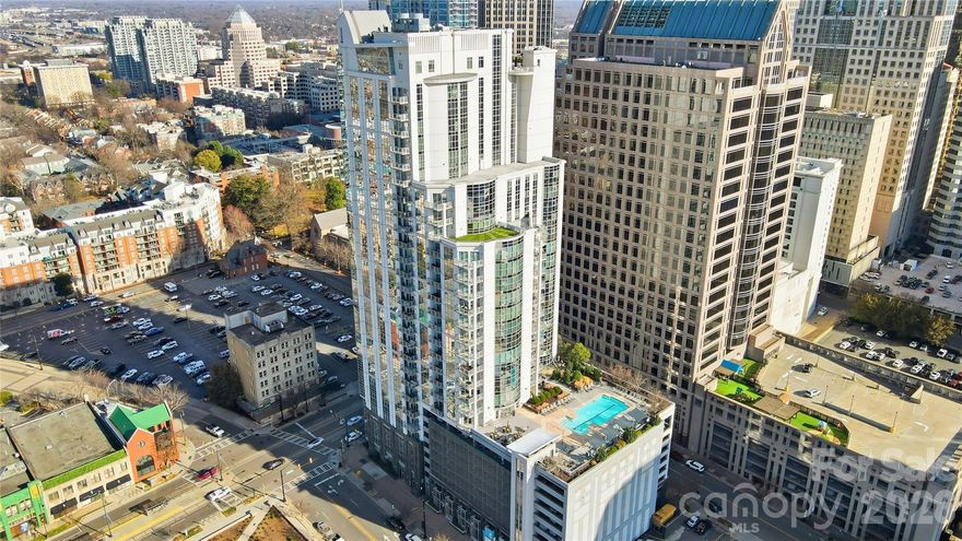 Experience elevated city living in this stunning Uptown Charlotte high-rise condo with breathtaking skyline views overlooking Truist Field. Expansive windows flood the space with natural light and showcase the vibrant energy of the city below, making this residence the perfect blend of luxury and location.

Situated just steps from the light rail and within walking distance to Bank of America Stadium, this condo offers unbeatable access to Uptown's top dining, entertainment, and business hubs as well as easy access to I-77. Whether you’re catching a Knights game, attending a Panthers game, or enjoying an evening out in Uptown, everything is right outside your door.

Residents enjoy exceptional community amenities, including a outdoor pool on an expansive pool deck including grills for entertainment, a fitness center including a Peloton bike and Echelon treadmill, a newly renovated resident lounge, and secure parking - this location is designed to enhance both comfort and convenience. This is a rare opportunity to own a front-row seat to the best of Charlotte living, where luxury meets lifestyle in the heart of the city.