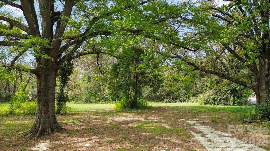 Unlock the Potential of 1.15 Acres in the Heart of Charlotte's Growth Corridor! We're offering a rare, shovel-ready assemblage of ±1.15 acres in one of Charlotte's established corridors. Already subdivided into 4 lots (2022) and sold as a unified package, this site is primed for a developer ready to move with confidence. The land checks every box: level topography, mature tree cover for natural buffers and aesthetic appeal, but more critically, city water and sewer availability. Zoned N1-C, this property carries built-in flexibility for residential development, and with the right entitlement strategy, multi-family development is possible. Whether you're envisioning townhomes or a small-scale multi-unit community this sire offers the canvas to make it happen. Positioned within close reach of Charlotte's urban core, with seamless connectivity to major roadways and surrounded by established neighborhoods that speak directly to end-user demand. Infill opportunities of this size, with this infrastructure, this zoning flexibility, and this location don't come around often in Charlotte. This parcel puts you squarely in the path of growth.