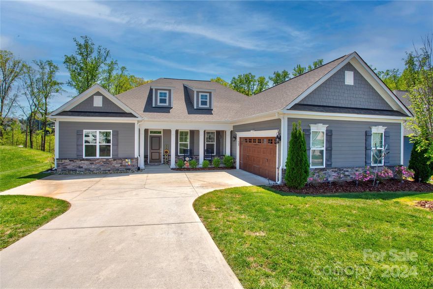 Meticulously maintained ranch in Bedford Farms w/split-bedroom floor plan-3 bed/2.5 baths.
The open floor plan flows into sunroom w/fireplace, perfect for relaxing evenings or lively gatherings. The heart of the home lies in its bright kitchen, boasting generous counter space-perfect for entertaining or indulging the home chef. 
Primary bedroom & spa like bath are tucked away for ultimate privacy.  Two addt'l bedrooms/a mother-in-law suite, with deluxe Safe Step tub.
Oversized (22x36) courtyard garage-storage solutions around every corner, ensuring that every inch of space is optimized. Attention to detail is evident throughout-exquisite coffered ceilings to the soaring 12-ft ceilings. 
Step outside into your sanctuary-20x20 covered outdoor area. Entertain guests w/built-in outdoor kitchen, against the backdrop of views/privacy. The ambiance is reminiscent of a mountain retreat, w/tongue & groove ceilings, recessed lighting, & shades.
Too many upgrades to mention!