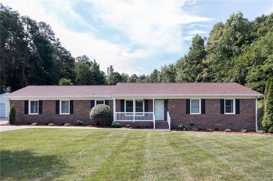 Enjoy country living in the city with 2.59 wooded acres and plenty of privacy.  This brick ranch features an open floor plan, in-ground pool, mature landscaping and NO HOA! Large media room/office has two entrances, gas fireplace, separate heating system and half bath. Sunroom has fireplace and picture window overlooking the pool.  Recent updates include new roof, pool liner and filter, heat pump, granite countertops, new sink, dishwasher, bamboo and laminate floors, remodeled bathroom and more.