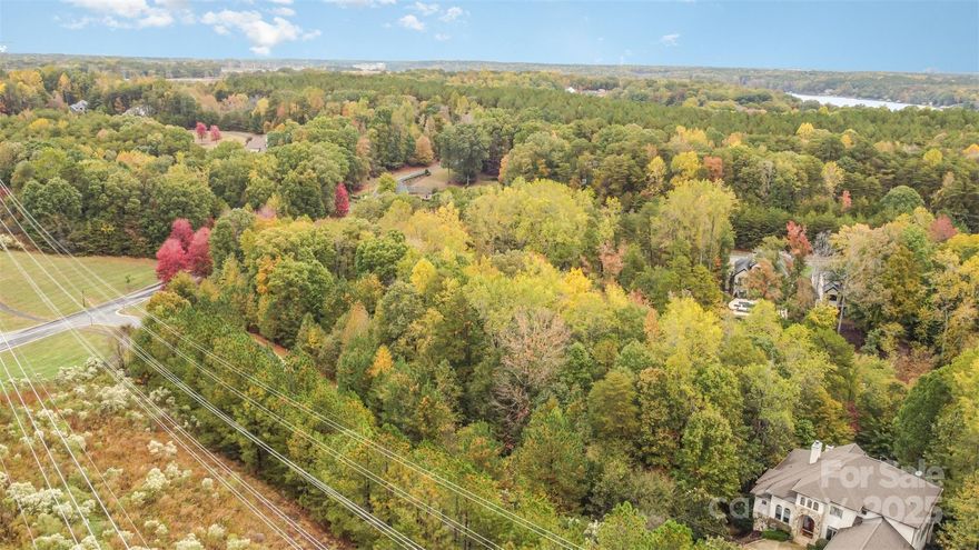 Welcome to Reflection Pointe, a prestigious gated community nestled on the shores of Lake Wylie in the charming and fast-growing city of Belmont, part of the greater Charlotte Metro area. This sought-after neighborhood offers resort-style amenities including a sandy beach area, lagoon-style swimming pool, elegant clubhouse, lighted tennis courts, scenic walking trails, soccer field, playground, and a private marina with boat storage options. Here, you can build your dream home and truly live your best lake life surrounded by natural beauty and a welcoming community!