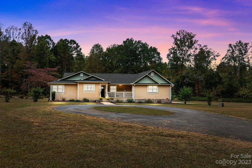 Completely Renovated in 2022, New Roof, Brand New Kitchen with Quartz Countertops and Walk In Pantry. Brand new Bathrooms with Tile Showers and Main Bathroom offers a Soaker Tub. All Brand New Hardwood Flooring Throughout the home. Home offers a 974sq ft 3 car garage with loads of Storage Space. Paved Driveway, Private Setting in Mt Ulla.