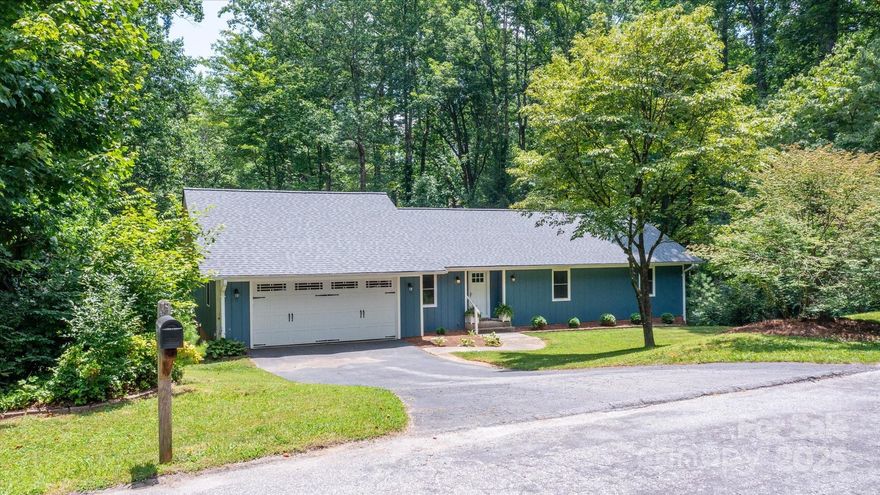 Welcome to 104 Britton Ave, a charming, fully renovated home in Dellwood Subdivision that is tucked away on a peaceful cul de sac. This updated home offers the perfect blend of privacy, modern upgrades, and family friendly outdoor space-just minutes from historic downtown Hendersonville. Set on a spacious .89 acre lot, this 3BR, 3BA home features 2620 sq ft of finished living space, ideal for both everyday living and entertaining. The interior boasts  complete renovations, enjoy a stunning kitchen with SS appliances and quartz countertops, updated living and BR areas, and a luxurious primary suite. The welcoming LR with cathedral ceiling offers warmth and character with a FP and custom built-in bookcases, while a sun porch off the main living area provides a cozy spot to relax and enjoy the natural surroundings. The finished basement adds an additional BR and BA-perfect for guests or teens. Recent upgrades include a newer HVAC, new windows, new roof in 2024. Please leave feedback!