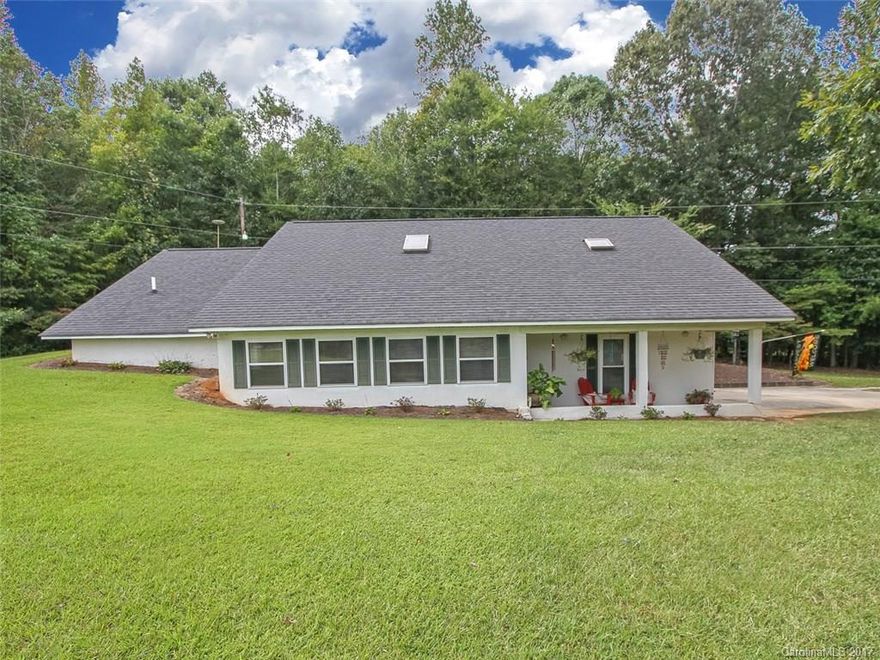 What a unique property situated on 2.35 acres with a pond view! This home boasts three bedrooms with skylights, a sunroom, and a side porch for relaxing and looking out at the water, and an open floor concept. Spacious master suite!