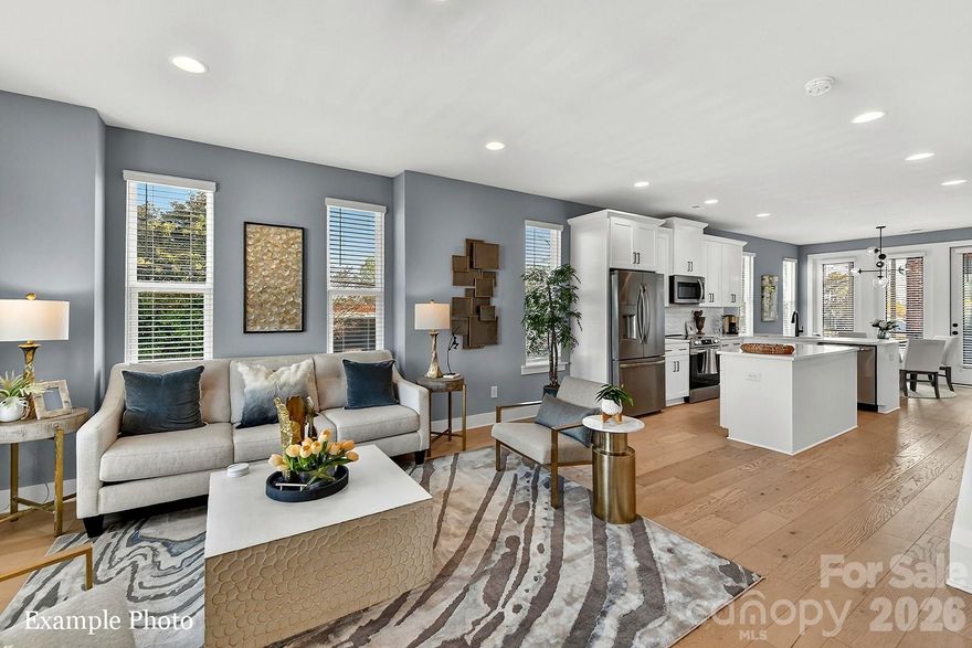 WOW! ROOFTOP TERRACE WITH CITY VIEWS, COMMUNITY DOG PARK AND CLOSE PROXIMITY TO UPTOWN BELOW $460K! Receive up to $13,000 towards closing costs and/or lowering the interest rate with our preferred lender! PREMIUM LOCATION JUST 2 BLOCKS TO CAMP NORTH END, LIVE IN A NEW, BEAUTIFULLY APPOINTED TOWNHOME! Discover Modern Industrial Living at "North End Terraces". A Unique Townhome Community of 69 Homes w/ Modern Design and Artful Architecture. Nestled between Charlotte's thriving Arts District, NODA, and the bustling Central Business District of Uptown. 

3 bedrooms, 2 full/2 half baths, 2 car attached garage WITH EV CHARGER. Upscale finishes including LVP floors throughout main living area and upstairs hallway, plus oak tread staircases leading to main & second floors. Designer kitchen with white cabinets, quartz countertops, polished herringbone backsplash, stainless steel appliances including range, dishwasher & microwave. Primary bath features a large, walk-in-shower with tile to the ceiling and basket weave tile wet-bed, modern black fixtures, tiled floors in all full baths and more! This home is not to be missed!

INVESTORS:NO RENTAL RESTRICTIONS.