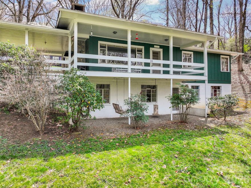 Authentic mountain cabin retreat in the sought-after Wild Acres community of Maggie Valley! This 3-bedroom, 1-bath home on the main level captures true cabin charm with warm wood interiors, a cozy living area with fireplace, and inviting spaces perfect for relaxing after a day in the mountains.

Ideal for investors or second-home buyers, this property offers excellent short-term rental potential with its classic cabin feel, desirable location, and proximity to year-round attractions. Guests will love the spacious covered porch and deck, perfect for enjoying the peaceful wooded setting and seasonal mountain views.

The walk-out basement adds even more opportunity, featuring a full bathroom already in place and plenty of space to expand, create a game room, additional sleeping quarters, or separate guest suite to maximize rental income.

Offered partially furnished for an easy, turnkey start. Convenient access via paved roads and just minutes to Maggie Valley, Waynesville, and outdoor recreation including skiing, hiking, and dining.