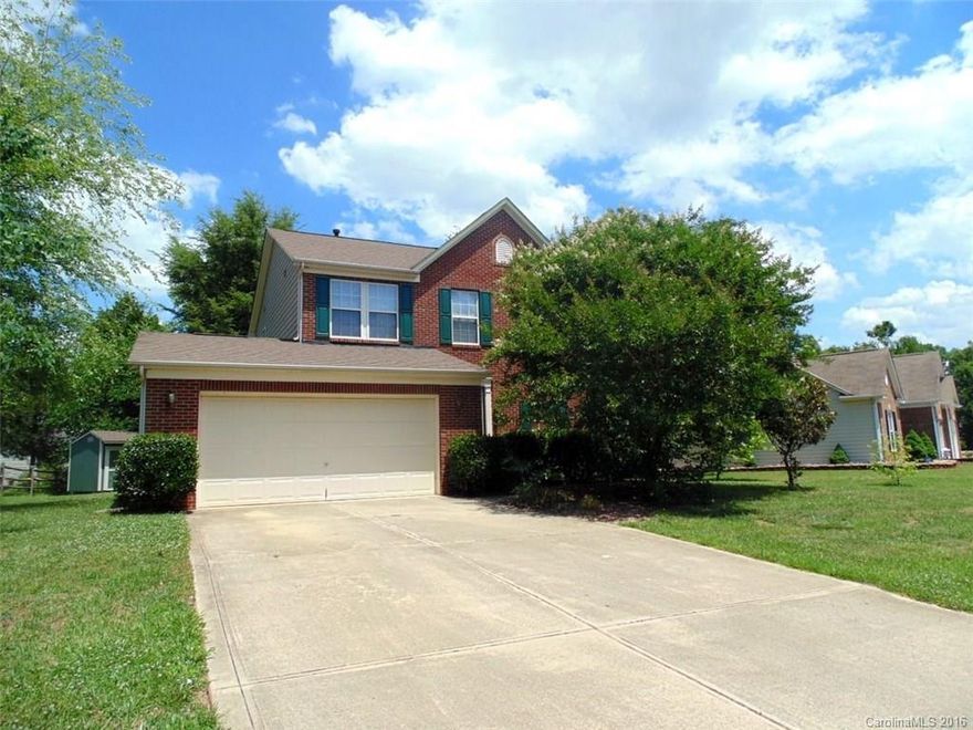 Gorgeous 2-story with brick full front in excellent location. Hardwoods in foyer, dining and great room. French doors lead to dining room/office. Large bedrooms. Master bath with dual vanities, garden tub and separate shower. Kitchen with eat-in breakfast area looks out over private wooded back yard and brick surround patio.