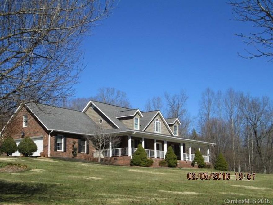 Wind your way home to this charming Cape Cod perched in the midst of over 11 acres of lawn, woodlands & gardens. Survey your estate from the wrap around front porch or enjoy the peacefulness of the private rear patio. As you enter the soaring foyer you will feel the warmth of home. The gleaming hardwoods lead past the formal DR to the spacious family room illuminated by the glow from the FP. Continue thru to the breakfast room and modern kitchen with abundant cabinetry and granite counter tops.
