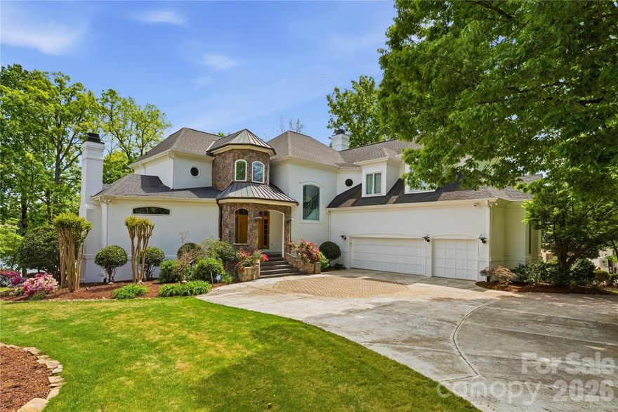 Waterfront home with a private dock on one of the most prestigious and quietest streets in the Peninsula. Immaculately maintained, this home awaits your personal touches. A European Contemporary with an open floor plan that leads to a terrace with water views and outdoor kitchen and dining. An amazing property but needs a little vision to make it your own lakefront slice of heaven. Preliminary pool approval from the HOA and room for expansion on the lower level. 3 car garage with hydraulic lift. A very short distance to the Peninsula Club (separate membership required) featuring golf, tennis, pickleball, swimming and fine dining. All amenities are a short distance away and downtown CLT and the airport just 35 minute drive away.