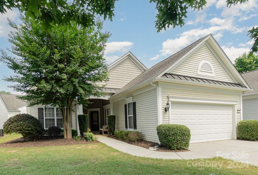 Come and enjoy resort-like living in amenity-rich Sun City Carolina Lakes! This beautiful 2BR/2BA Surrey Crest home is move-in ready, with a spacious living room, bright and beautiful sunroom, and a flex room that could be used as a den/office/study/craft room. Located in the highly sought-after Grey Hawk neighborhood, this lovely home features tile flooring in the foyer, kitchen, sunroom, & bathrooms, w/carpeting in the living room, flex room, & bedrooms. Solar tubes in the kitchen & second bathroom keep these areas bright throughout the day. Relax and enjoy the beautiful outdoor entertainment area which features a large pergola, paver patio, and sitting wall. NEW HVAC (July 2024)!

Now is the time to live your dream! Come and enjoy all the beautiful amenities & diverse activities this premier 55+ community has to offer! Sun City Carolina Lakes has a public golf course and is in close proximity to shopping, restaurants, medical facilities, recreation areas, entertainment, and more!