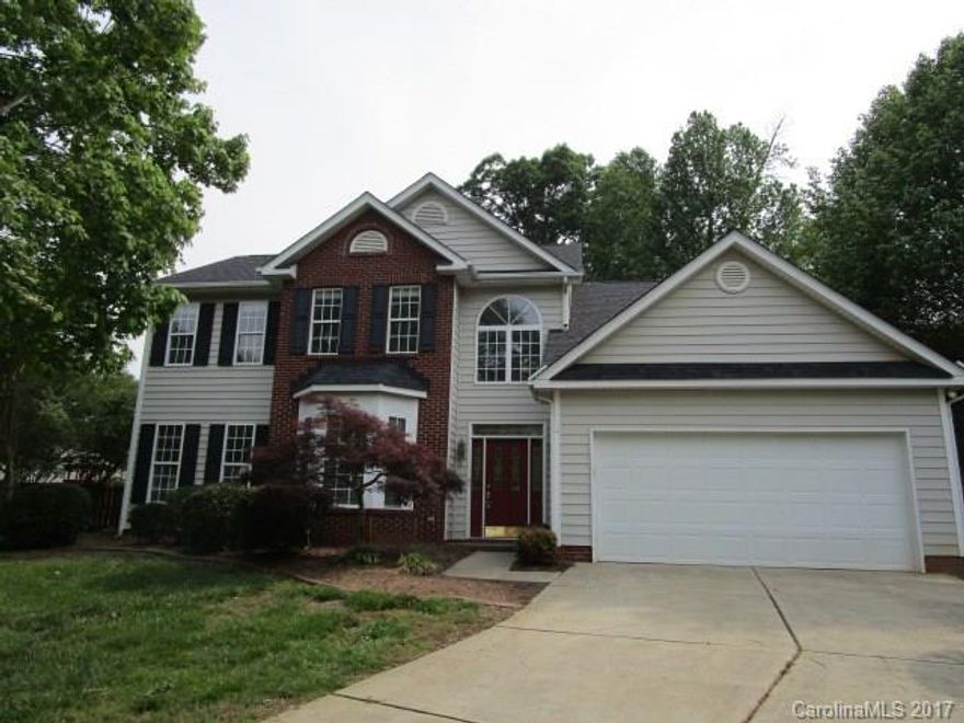 ELLINGTON PARK  Heart of Ballantyne! Welcome to this wonderfully updated 4 /5 bed ,2.5 bed home on a large fenced cul de sac lot w/a lovely heated glass  sunroom w/ see thru fireplace for relaxing nights ! Newly painted throughout , new carpet ,& refinished hardwoods gleam!  New stainless appliances, & granite counter tops in the open/ spacious kitchen! Master suite on main level ! Formal living rm , and dining rm, & expansive great room w/fireplace.