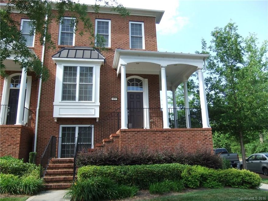 Beautiful End Unit in The Views at Baxter, Wrap around Porch with view of fountain, Natural stained Hardwoods on Main Floor,Granite Counters in Kit w/Tile Backsplash, Stainless Appliances, Corner Fireplace w/Gas Logs, Formal Dining Area & Powder Room on Main Floor, Master Suite has Tray Ceiling & Walk-in Closet, Soaking Tub, Corian Counters, 2 lavatories  & Ceramic Tile Floors. Hall Bath w/tub & Shower, Lower level  has Bedroom 4, Bath with Shower, Tons of Storage Space, Deck over 2 Car Garage