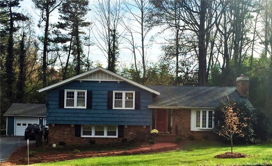 Walk to Costwold Shopping Ctr.. Over sized garage, spacious sunroom-glass/screened w/vaulted ceiling and brick accent wall, formal DR and LR on main. Lower level - large den, BR, full BA, laundry room, separate entry, perfect for game room, mother in law suite - endless potential.  Kitchen countertops re-glazed, Tile/Tub in bathrooms re-glazed - like new! Windows have been replaced and all appliances are included. Popular location, many high end renovations and new builds. Fireplace sold as is.