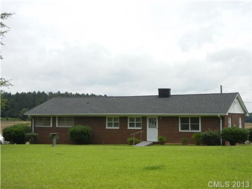 Brick ranch. Features: Washer & dryer, kitchen, breakfast area, living room, glass porch, 1 car attached carport, on 1 acre. Beautiful, quiet country setting. Near Pee Dee Wild Life Refuge.