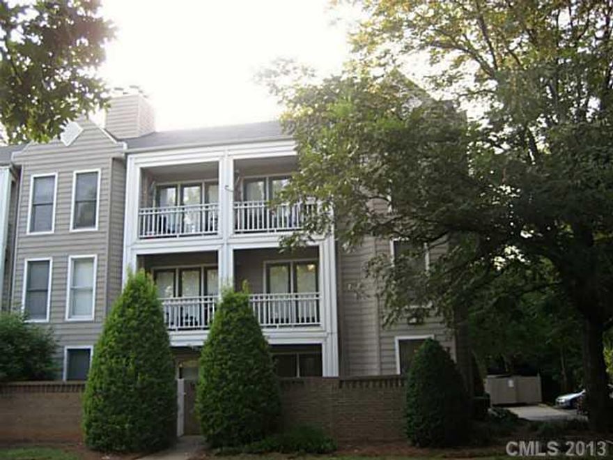 Price just reduced - now below tax value!   Minutes from uptown!  This freshly painted condo has a good sized kitchen, opening to a large great room with wood burning FP . Off the great room is a patio to enjoy morning coffee or relax in the evening.  Two bedrooms on 2nd floor with 2 full baths.  Small porch off back bedroom.  So convenient to everything!  New carpet installed on first floor!  Fireplace and chimney being sold "as is".  No known problems.