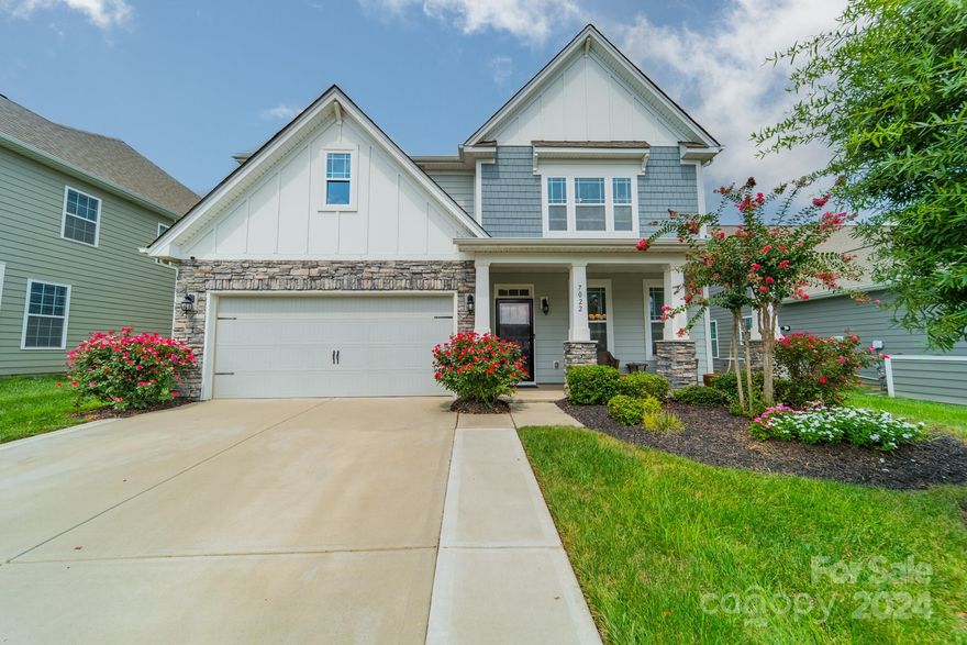 Welcome to 7022 Bareland Road, a charming home in Indian Land, SC that offers a unique blend of comfort and style. As you enter you are greeted with a floor plan that maximizes comfort and functionality. Natural lighting in the main living areas create an inviting ambiance for everyday living and entertaining.The Gourmet kitchen is equipped with a custom pantry for all your culinary essentials. Custom-designed closets are also included in the primary bedroom, offering ample storage space for your wardrobe and personal belongings. Step outside to discover a private oasis, featuring a screened porch and expanded paver patio with a charming fire pit, perfect for cozy evenings under the stars. Privacy trees with uplighting create an enchanting atmosphere, while the irrigation system ensures the lush landscaping remains vibrant year-round.The expanded driveway provides ample parking and adds to the overall curb appeal of the property. Don’t miss out on this remarkable property.