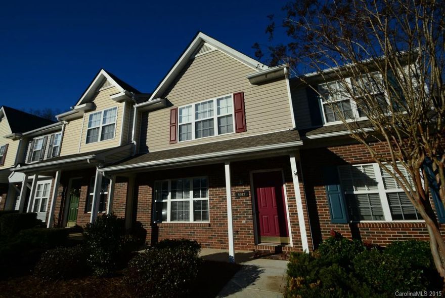 Updated & move-in ready. Upgraded laminate wood floors in Living & Dining. Kitchen features ceramic tile floors, recessed lighting & island w/seating bar overlooks private patio w/storage area. Dual Master suites upstairs feature vaulted ceilings, walk-in closets & private baths w/dual sinks. Updated light fixtures & brand new carpet. All appliances and one-year home warranty included. Community pool. Low taxes & just a short drive to Ballantyne!