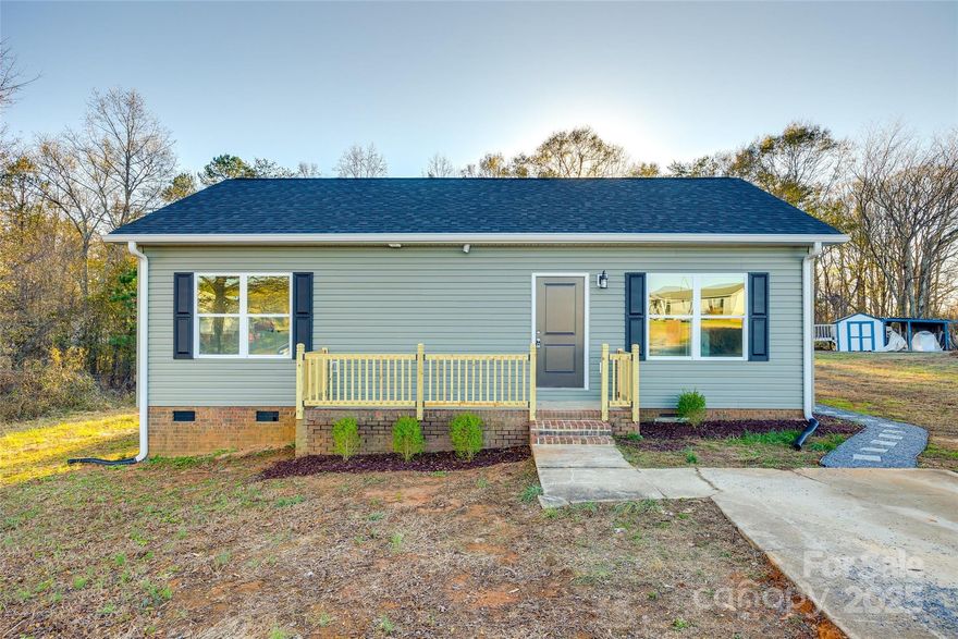 This brand-new construction home in Grover, NC offers the perfect blend of modern design and peaceful rural living. It is a complete new build down to the foundation - foundation is the part that is existing from 2000.  Located on a spacious .55-acre lot in a quiet cul-de-sac, this charming 3-bedroom, 2-bathroom home spans 1,013 square feet. The open-concept layout is enhanced by custom cabinetry, sleek quartz countertops, and luxury vinyl flooring throughout, creating a stylish and durable living space. With no HOA and the serenity of a rural setting, the expansive yard offers endless possibilities for outdoor activities, gardening, or future expansion. It’s the ideal retreat for those seeking both comfort and tranquility.