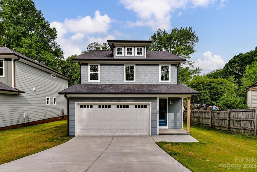 Welcome to your dream home in the highly sought-after Oakhurst neighborhood of Charlotte! This captivating 2-story construction includes an array of luxurious features and contemporary finishes. With a spacious 2-car garage and a large fenced yard, this residence offers both convenience and privacy. The main level presents a thoughtfully designed layout, featuring a primary bedroom that ensures comfort and accessibility. Hardwood flooring throughout the main level exudes elegance and durability, while a tankless water heater guarantees endless hot water for your daily needs. Culinary enthusiasts will relish in the chef's kitchen, complete with a gas cooktop, wall ovens and a large island great for entertaining. The modern finishes and attention to detail add a touch of sophistication to every corner of this remarkable home. Don't miss the opportunity to own this exquisite property in the highly desired Oakhurst neighborhood, where contemporary luxury meets timeless charm.