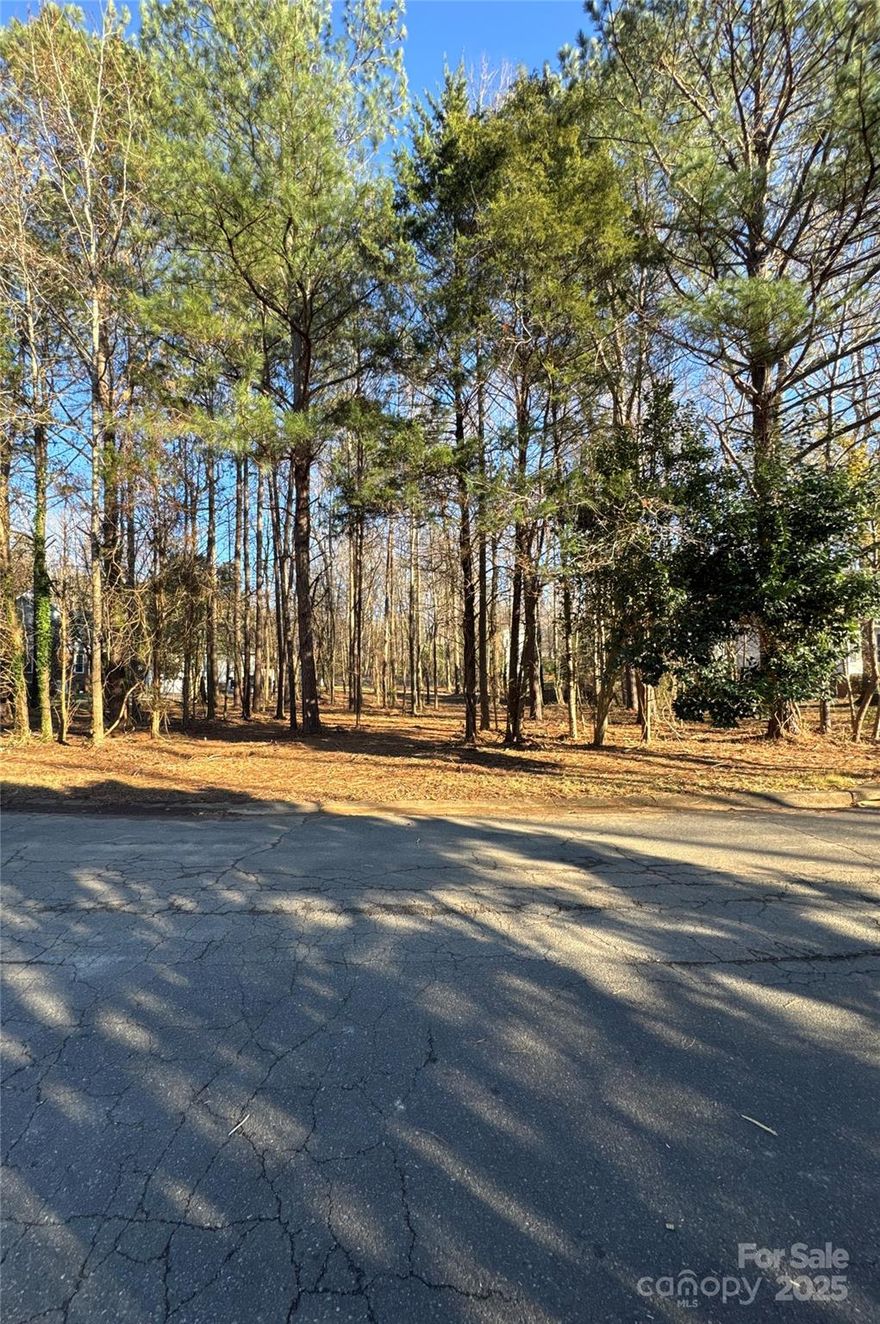 One of the last remaining lots in the beautiful Oakhurst subdivision. This lot is convenient in timing to local schools as well as all downtown Rock Hill has to offer. The owner has partially cleared the lot with the exception of a few hardwoods. Your dream home is waiting!