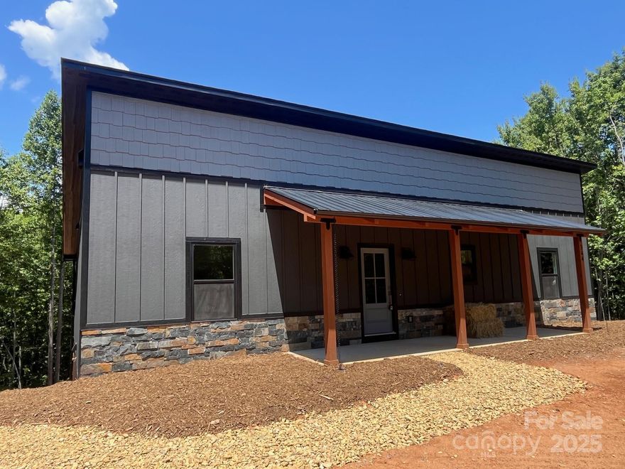 Brand-new Construction home in the desirable Forest Heights development located in the foothills of western North Carolina. This private Mountain retreat on 2.51 acres is designed for low maintenance living with all the essentials on the main level. The Split bedroom, open floorplan offers great space to entertain. Nice upgrades including granite counter tops, stainless steel appliances, custom cabinets, and luxury vinyl plank flooring throughout. The primary bedroom has a walk-in closet, tile shower and bath and large sliding glass door. RW flame color changing fireplace in the living room with shiplap accent wall. Large deck overlooking the wooded back yard with mountain views peeking thru the treetops. Full unfinished basement so there's room for expansion. Just 10 minutes from Marion Lake Club Golf Course and beautiful Lake James.  5 miles from Interstate 40 and 40 minutes to Asheville or Hickory. This house and the area have so much to offer. Vacation rentals are allowed!