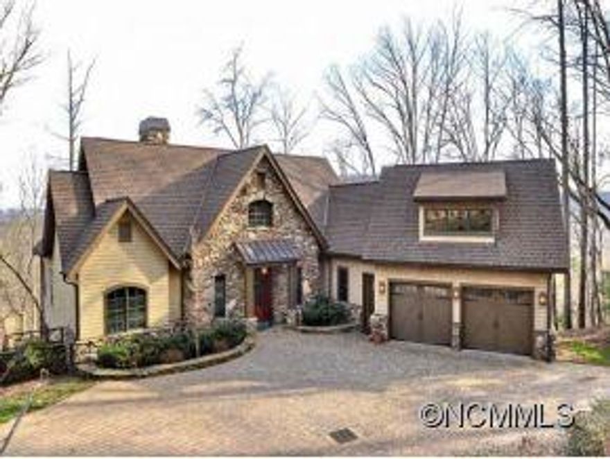 Opportunity Short sale Rustic, mountain style, stone and timber. Open great room, wonderful kitchen with Viking appliances. Spacious, private master suite on main. Guest area, big screen room. Office on lower level. Views! In coveted south Asheville gated community with membership Nicklaus signature golf course, clubhouse, state of the art wellness center,tennis,indoor/outdoor pool,hiking trails,  minutes to airport,hospital, downtown
