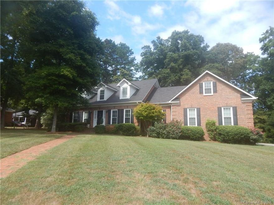 Fantastic, brick home in popular Shiland Hills subdivision with 2 car attached side load garage!  This home features formal spaces, eat in kitchen, 3 bed/ 2.5 baths, plus a bonus room, and a large deck overlooking the private back yard.   Kitchen has granite, countertops, stainless appliances, including a double wall oven, and work island.  You'll also love the hardwood floors, large laundry room, and huge master bath.