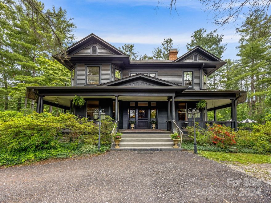 Luxury and elegance are perfectly married with original charm in this expertly renovated 1904 home. The gracious 12 foot wide foyer, Virginia heart of Pine floors, 8 fireplaces, 12 foot ceilings, and solid wood pocket doors are just some of the original features that make this home one of a kind. Couple the historic charm with a top-of-the-line chef's kitchen with copious amounts of marble, inviting in-ground pool, quaint greenhouse, and lush grounds, you’ll be wowed at every turn. With over 4000 square feet and 5 bedrooms, there is plenty of room to spread out inside or out. Nestled on 1.4 acres just minutes from Main Street in Hendersonville, this property strikes the perfect balance between privacy and convenience, making it a truly rare and exceptional find.