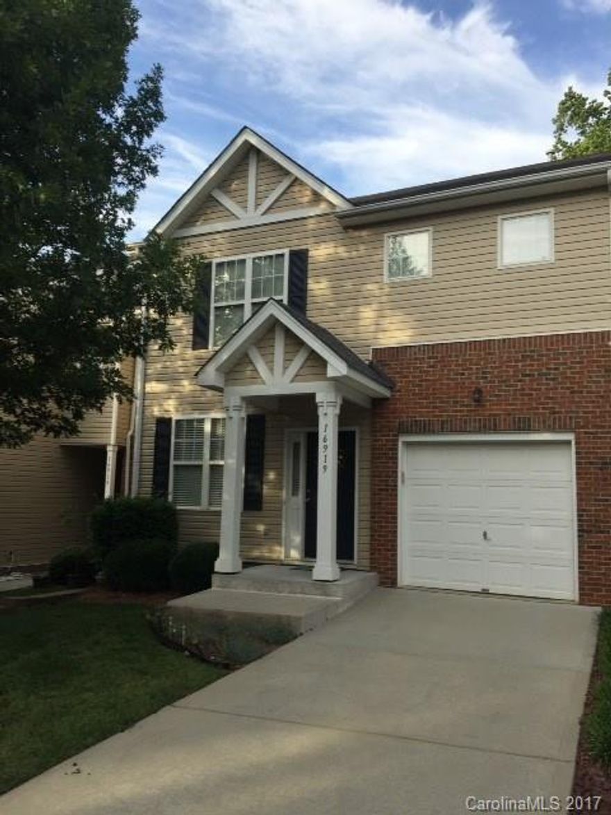 Stunning townhome in Ballantyne area with open floor plan, new granite counters with breakfast bar & hardwood floors.  Two-story great room features new modern fireplace that opens to deck overlooking private wooded lot. Master on main as well as second-floor; both have en-suites with huge closets. Beautifully updated bathroom floors and fixtures upstairs. Spacious loft can be used for office or recreation area. Newer heating and air-conditioning systems. Water & sewer included in the HOA fee.