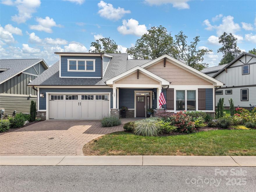 Beautifully crafted 3 bedroom, 3 bathroom Arts & Crafts home in the gated community of Pinnacle at Arabella Heights. Enjoy main-level living with open floor plan, vaulted ceilings, gas fireplace, and large windows framing long-range mountain views. Gourmet kitchen with granite counters, large kitchen island, stainless appliances and pantry. Luxurious primary suite with double vanity, spacious shower, walk-in closet and access to private back deck overlooking stunning views. Low-maintenance lot with HOA-included lawn maintenance. Community amenities include clubhouse, fitness center, pool, and trails. All just minutes from Biltmore Park and downtown Asheville.