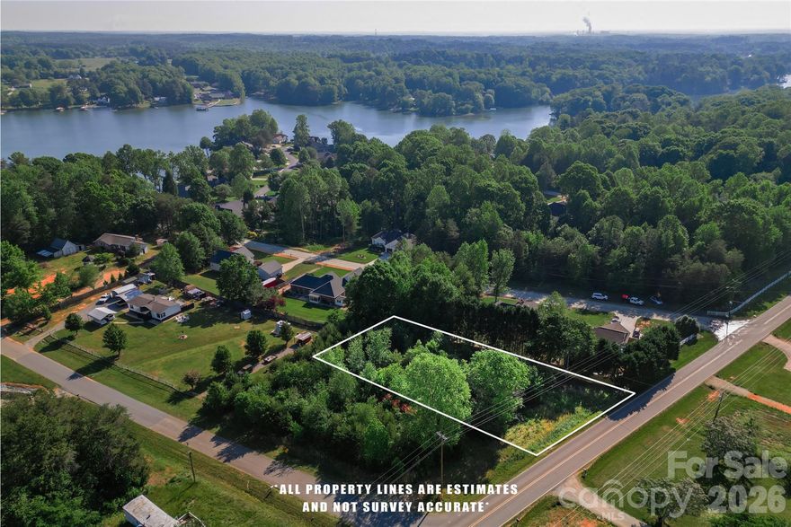 Build your dream home just steps from Lake Norman. Enjoy the ultimate balance of nature and convenience—less than one mile to the new Mountain Creek Park, featuring 600+ acres of hiking and biking trails, pickleball courts, waterfront areas, and a fishing pier. This peaceful setting is tucked away, yet only 5 minutes from everyday conveniences including Starbucks, Publix, and the new Chick-fil-A with no HOA restrictions. Secure your place in this lake area today—your Lake Norman dream home starts here. Note: lake community but this lot has no lake access. Well and septic onsite.