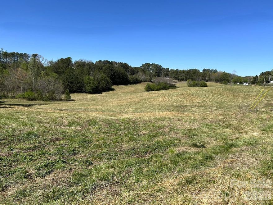 Unrestricted 12.6 acres that has been recently surveyed out of a larger parcel. Frontage on both Pea Ridge & Russell Roads. Has been used mainly as pastureland over the years. According to relatives it was last rented to board horses from TIEC 3-4 years ago. Entire perimeter has old, barbed wire fencing. Approximately 10+ acres open w/remainder in trees. You can walk from property to Parker-Binns Winery. There is an old mobile home & barn on property that are both in poor condition & have no value (please do not enter as they are unsafe). Please call with any questions.
