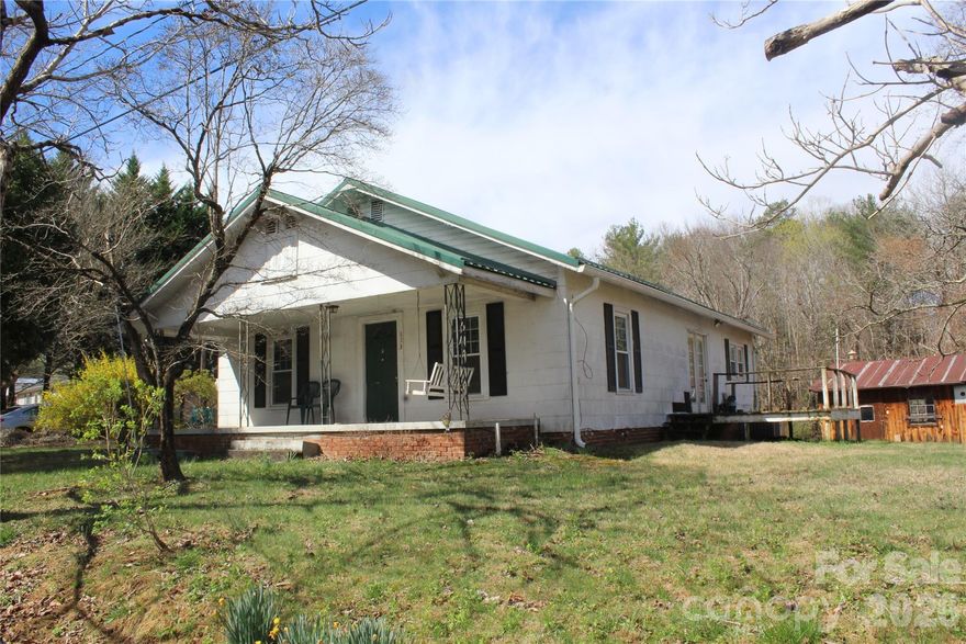 Don't miss out on this charming cottage-style home in the city limits of Drexel! Home features three-bedrooms and one bathroom with a living room and kitchen. Enjoy your morning coffee on the front porch. washer and dryer on back porch, not heated.The property also features a large 24x36 detached workshop with electricity, perfect for hobbyists or extra storage. Detached single garage for parking. Convenient to downtown Drexel and US Hwy 70 for easy access to surrounding areas. heated 1340 sq. feet