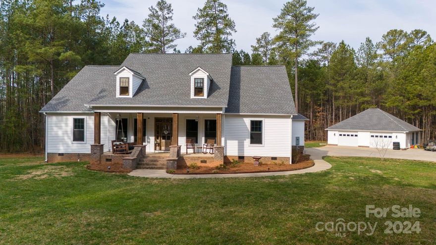 Welcome to Derby Downs Subdivision, an idyllic equestrian community with countryside charm. This stunning 3-bedroom, 2.5-bathroom home boasts an inviting open floor plan, accentuated by a vaulted ceiling & cozy fireplace in the great room, seamlessly flowing into the kitchen equipped with a breakfast bar & pantry. Retreat to the luxurious primary suite featuring a tray ceiling, dual sinks, a spacious garden tub, a separate shower & a walk-in closet. Convenience meets functionality with a large laundry room complete with a sink & space for a freezer. The attached 3-car garage provides ample parking, while an oversized 2-car detached garage offers additional storage or workspace. Nestled on a private cul-de-sac lot spanning 6.5 acres, this property offers ample space for outdoor activities & relaxation. Plus, there's potential for expansion - consider adding a staircase just outside the laundry room to finish the attic and create a bonus room.