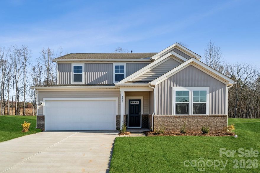 Welcome Home to the Harding at Carpenter Farms! Boasting 2,570 square feet, this spacious and beautifully designed home features 5 bedrooms and 3 baths, with two bedrooms and a full bath conveniently located on the first floor. The open floorplan creates a warm and inviting atmosphere, perfect for hosting gatherings with family and friends. The kitchen is a chef's dream, complete with quartz countertops, a large island, and top-of-the-line appliances. Cozy up by the electric fireplace on chilly evenings and enjoy the peaceful sanctuary of the primary bedroom with its luxurious bath and spacious walk-in closet. Sit outside and enjoy your private backyard on a wooded lot. Built by one of the top ten builders in the country, you can trust in the quality and craftsmanship of this stunning home. Located in a desirable neighborhood with a community pool, dog park, playground, and activity field. Don't miss your chance to make this dream home yours!