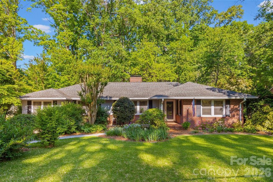 Walk the coveted neighborhood of Whiteville Park with its tree-lined streets and friendly faces and you will see why folks are anxious to call it home! This 1950's brick ranch is loaded with character and situated on a very rare one acre lot! You will love the warm hardwood floors, formal spaces, masonry fireplaces and wonderful porch on the back. The bedrooms are spacious and bathrooms have charming tile. The garage conversion is now a large bedroom and oversized laundry room. This home has been well loved and has so much potential for the new owners to make it theirs. The beautifully landscaped yard is full of flowers and mature trees. The back yard is private with a great shed with work space and offers so much room for expansion or other outbuildings. Homes in this neighborhood rarely come available so do not delay!