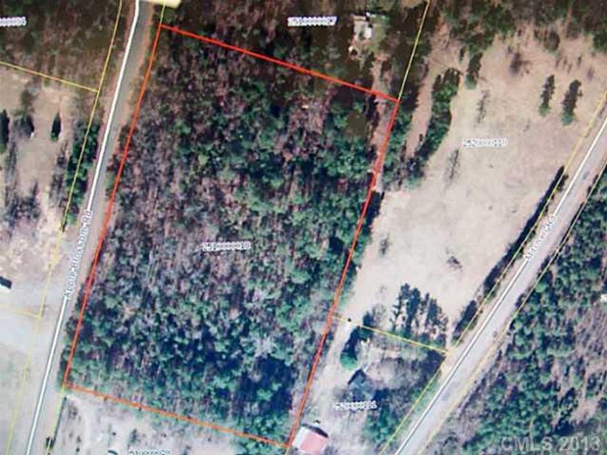 This is a wooded 6 acre track that can be split by the new owner for 2-3 acre lots.