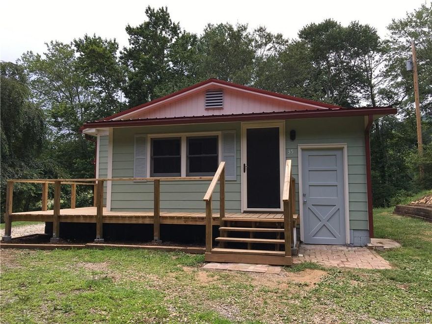 Newly renovated farmhouse with new metal roof, remodeled kitchen, lovely modern bathroom with double vanities, new flooring throughout, and newly finished big mudroom/laundry. Ready to move right in. Relax on the covered front porch with beautiful mountain views, and watch the neighbor's horses grazing right next to you. Extremely private, with tons of potential for the flat land behind it. Clear it out, and subdivide or keep the privacy to yourself (buyer to confirm that land is sub-dividable).