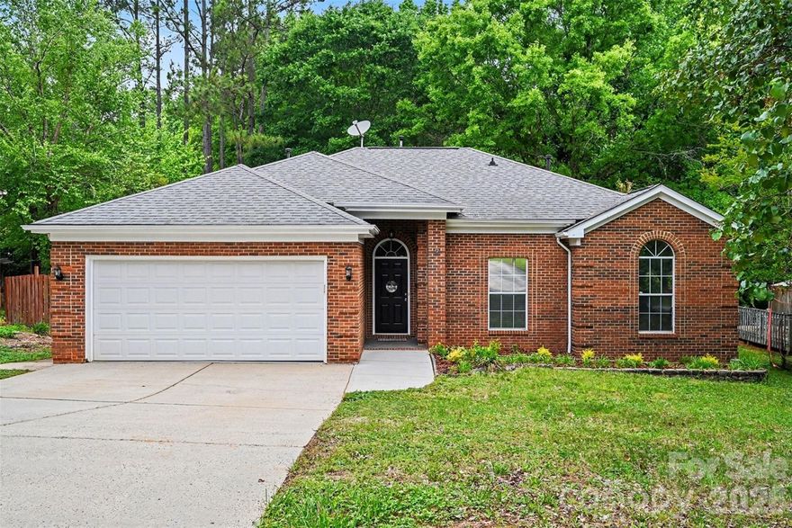 Beautiful brick-front ranch in a prime Pineville location near Ballantyne, I-485, shopping, dining, grocery stores, and Ballantyne Ridge High School. This 3 bed, 2 bath home offers 1,536 sq ft, an attached 2-car garage, and NO HOA on a private 0.27-acre lot. Inside, enjoy a spacious living room with vaulted ceiling, warm wood-style flooring, fireplace, and great natural light. The kitchen features brand-new appliances, ample cabinetry, and an inviting dining area overlooking the backyard. The primary bath offers a dual vanity, soaking tub, and separate shower. Step outside to a large deck surrounded by mature trees, creating a peaceful setting for relaxing, entertaining, or enjoying the natural privacy. HVAC replaced in 2019 and water heater replaced in 2022. A fantastic opportunity for a primary residence, long-term rental, or short-term rental investment in one of the area’s most convenient locations.