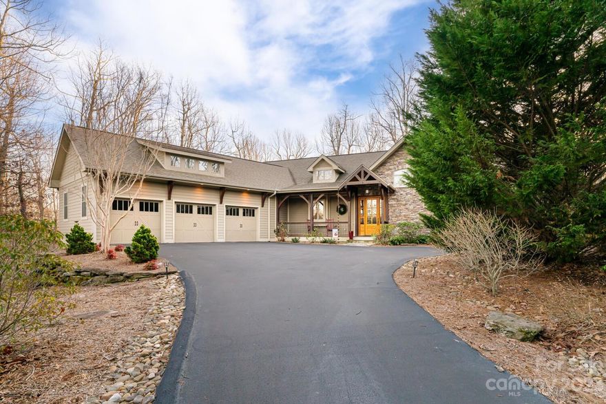 Absolutely stunning home located in prestigious Kenmure- a gated golf course community. This exceptional and rare find home is situated on 0.91 mostly level acres with a private natural setting. The main level boast an open floor plan, hardwood floors, great room with floor to ceiling stone gas fireplace, wall of windows/sliders, gorgeous tongue and groove cathedral ceiling, kitchen with high-end appliances, island with prep sink, tile backsplash, breakfast bar,  pantry, dining area, primary suite with sitting area, walk-in closet, walk-in tiled shower, air tub and double vanity, guest bedroom & bath, laundry room with built-in desk, cabinetry and sink. The lower level features a family room and den, guest bedroom, guest bath, amazing workshop w/ door to outside and utility/storage space. Fantastic outdoor living with the covered front porch, the open deck and the large screened porch. 3 car garage and generator. Great location and setting for true luxury mountain living at its finest.