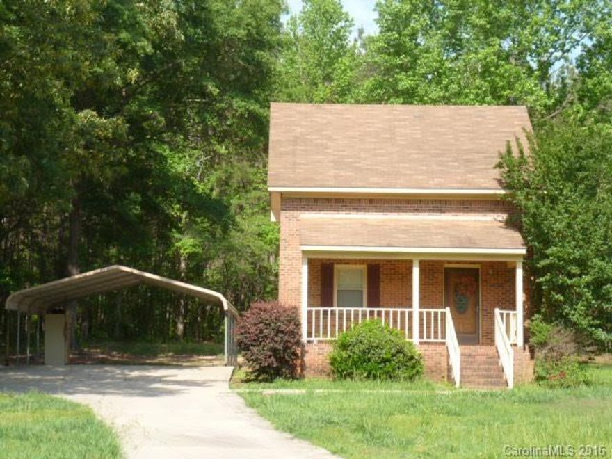 Great starter home for you first time homebuyers. Features include 2BR, 1.5 BA, kitchen/dining combo, bonus room in back, great room, dbl detached carport all this on almost an acre lot. Private and wooded. Seller will consider installing central heat and air in home with an acceptable offer.