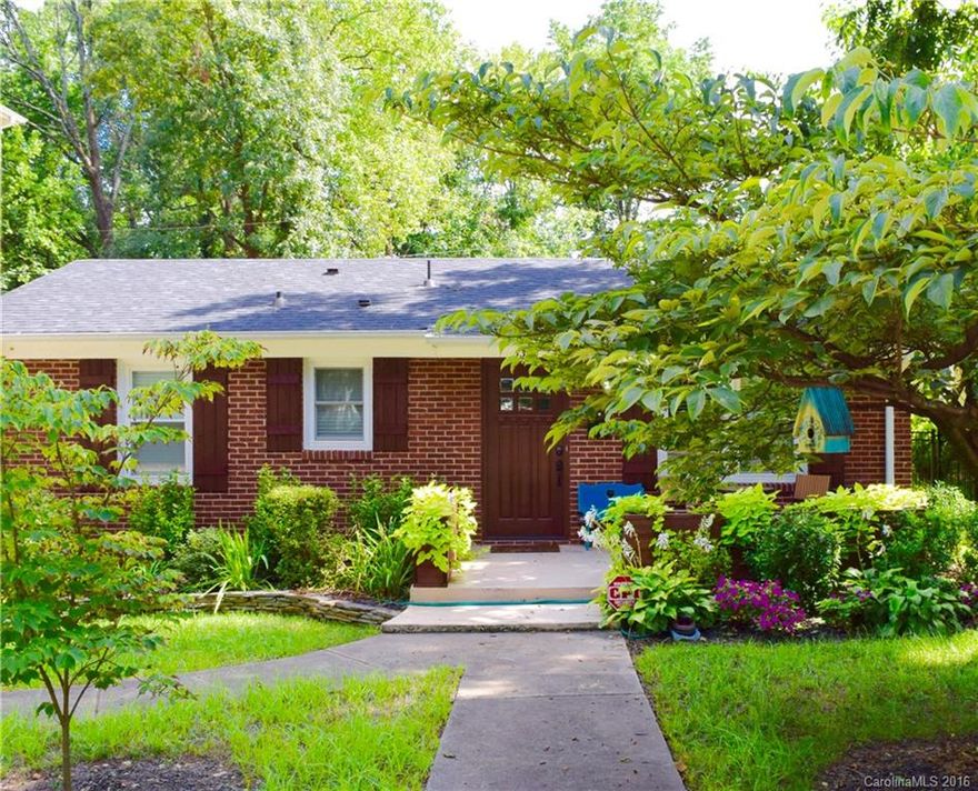 Adorable, immaculate, landscaped, brick ranch in NODA! Move in ready, home is pristine! Granite & SS kitchen.Bath w/dbl.sinks,granite,lg.tub/shower,tile&built-ins. NEW electrical,appliances,plumbing,insulation,doors, Pella windows,architectural shingle roof,fully fenced back yard,interior-ext. french drain system,crawl space insulation & vapor barrier. NEW HVAC for up to 1500 sq.ft. & new upgraded 200AMP panel should you add on.Updates spring '14. Walk to LYNX 36th st station.Large lot @.32 acre