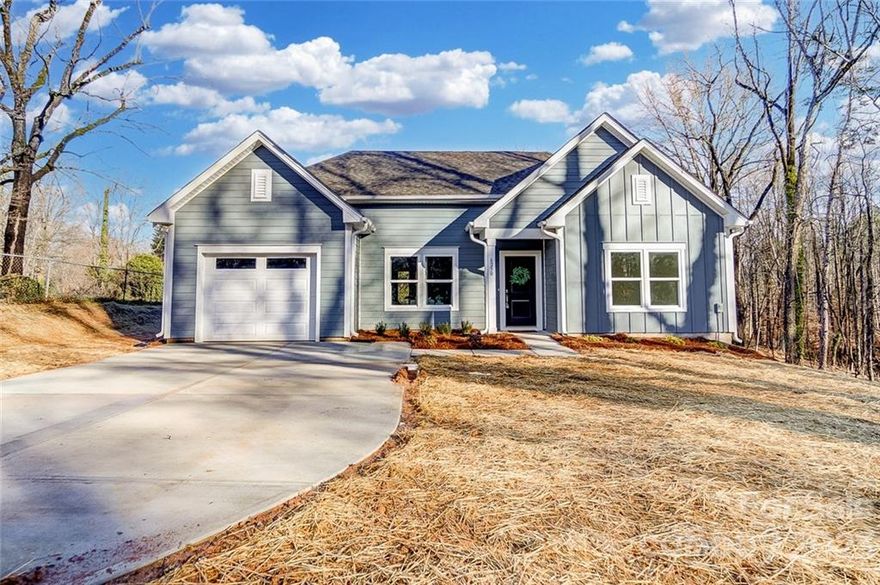 We are thrilled to share this beautiful single-story home located conveniently near Mountain Island Lake and Uptown Charlotte! The open-plan layout of this home features 9' ceilings and luxurious finishes throughout, such as granite countertops, luxury vinyl plank flooring, designer lighting, and a tile surround shower. The kitchen island is complete with stainless steel appliances, and the home is supplied with well water. The spray foam insulation helps to keep energy costs low and the home comfortable. The backyard is a true oasis, providing plenty of privacy and a tranquil atmosphere. You'll feel miles away from the hustle and bustle of the city, and there are no HOA fees to worry about. Don't miss your chance to own this amazing home!