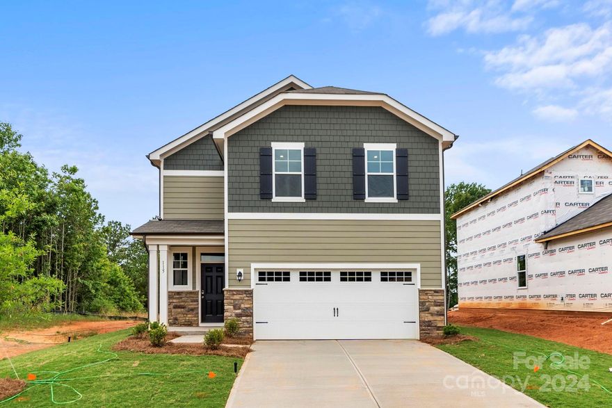 Come see why everybody is talking about living in York, SC. The Mitchell is a Beautiful 4 Bedroom, 2.5 bath home located in the highly desired area of York County.  Welcome to Asbury Ridge where you will find beautiful wooded lots, winding roads, walking trails, playground, sidewalks and easy access to shopping, dining and adorable downtown York.  The floorplan is one of our most popular and features an open kitchen, dining and great room in rear of the home overlooking the patio. Tons of storage 6 closets plus under stairway and walk in pantry. Primary bedroom and bedroom 4 have walk in closets. Loft area can be used as an office or additional living area, playroom etc.  

Easy access to Hwy 5 and 49 make your commutes very direct.  Situated near local shopping, dining, and parks.