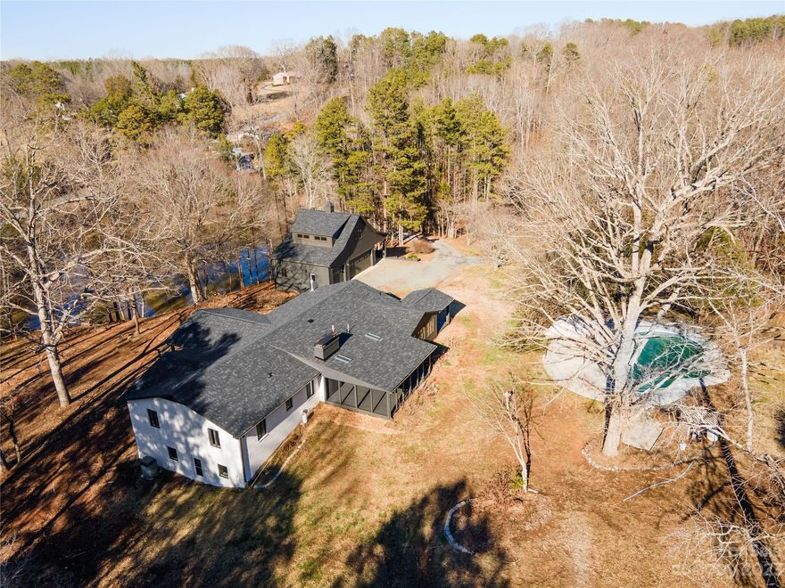 Welcome to this private retreat located on 18 acres in Mount Pleasant! Freshly painted on the exterior, this home has been updated in a few different areas including the kitchen and a new roof. The kitchen flows into the living room which has a great view of the private pond along with the front porch. Multiple perks to this property include a 3 car garage with bonus room upstairs, finished basement, outbuildings, 3 creeks, fruit trees, pool and separate gravel driveway to another area of the land. This property is in close proximity to Historic Downtown Mount Pleasant for shops, restaurants, bakery and coffee shop. If you're looking for privacy, more space but still close to a modern conveniences, this is the home for you!