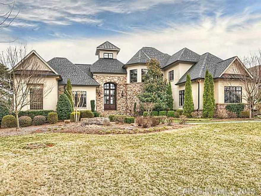 8071 sq. ft,/2 pools plus spa,/gas outdoor fire pit/Fantastic WF! Definitely a "Cooks Kitchen"! Intregrated Home Theater and Home Technology System. Lake level has huge bar with pool/gamenarea/Theater  with Concession Bar plus rec rm w/natural stone FP. Wine Cellar,gas grills on LL & Main. Spa cascades to small "dipping pool" plus separate large pool w/ water feature & Swim jet.. DON'T MISS THIS!