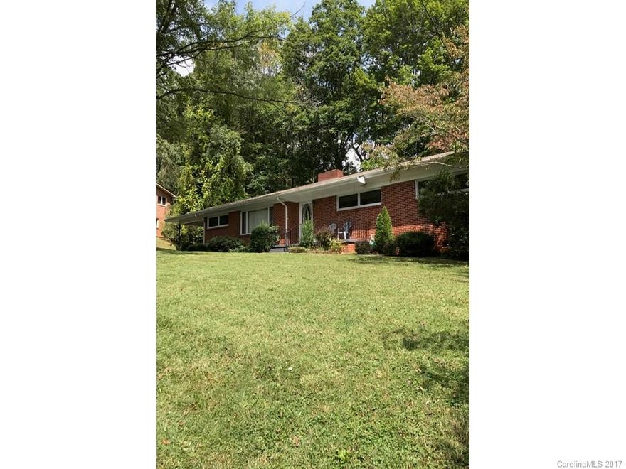 All on one level brick ranch in established Lake Junaluska neighborhood.  Road maintenance collected in county taxes.  Easy access.