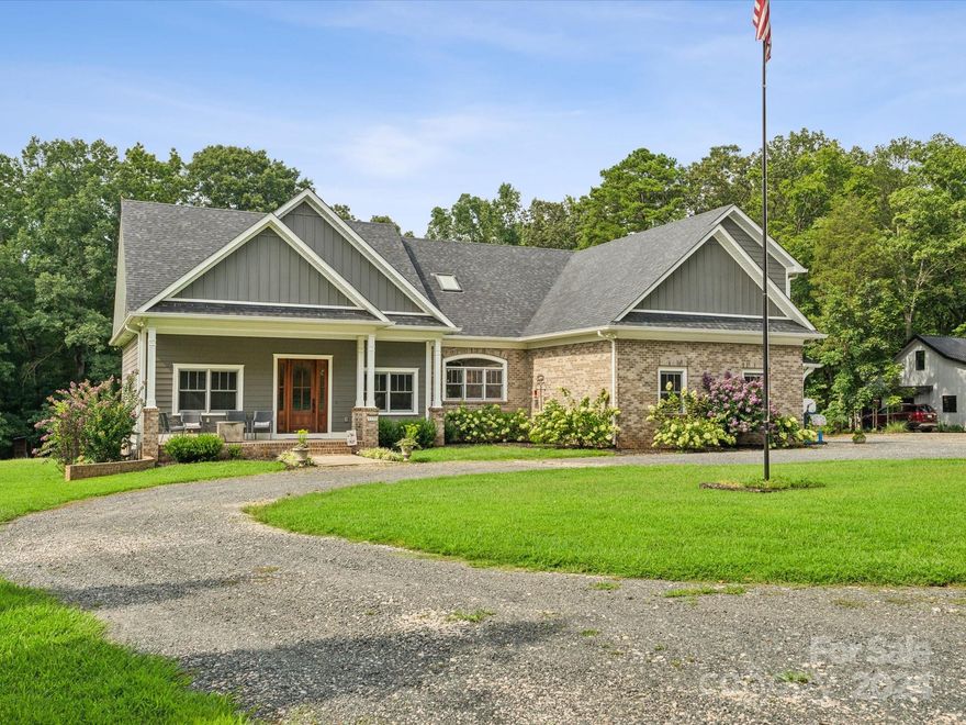 Handsome custom home with two additional living quarters on private acreage just outside downtown Fort Mill. Stunning main house features large great room, kitchen with reclaimed wood ceiling and beams, built-in banquette, bedroom and office/flex space with closet. Primary suite includes ensuite bath with heated floors and towel bars, shower and free-standing soaking tub. Laundry room has a half bath. Second floor could be second living quarters with full kitchen, bedroom, bath, and washer/dryer. Great walk-out attic space! Screened back porch with ceiling fans and heaters. Water filtration system for whole house. Separate cottage is the same quality as the main house. It includes great room, kitchen, bedroom, office, full bath, and laundry. Cottage porch is screened with hot tub. ALSO, 2364SF workshop with roll-up door, porch, office, bathrooms, and kitchen. See list of specs and upgrades in attachments. Shared driveway. All floor plans in attachments. Appointment only! No drive bys!