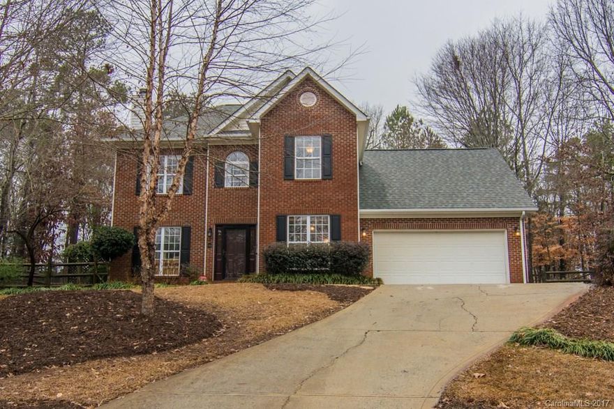 Just minutes from downtown Waxhaw, this home features granite countertops in the kitchen, double doors leading to the formal dining room, and a spacious master suite with a walk-in closet. The gorgeous, private, fully fenced-in backyard backs up to the woods and also features a large screened in sunroom for all of your entertaining needs.